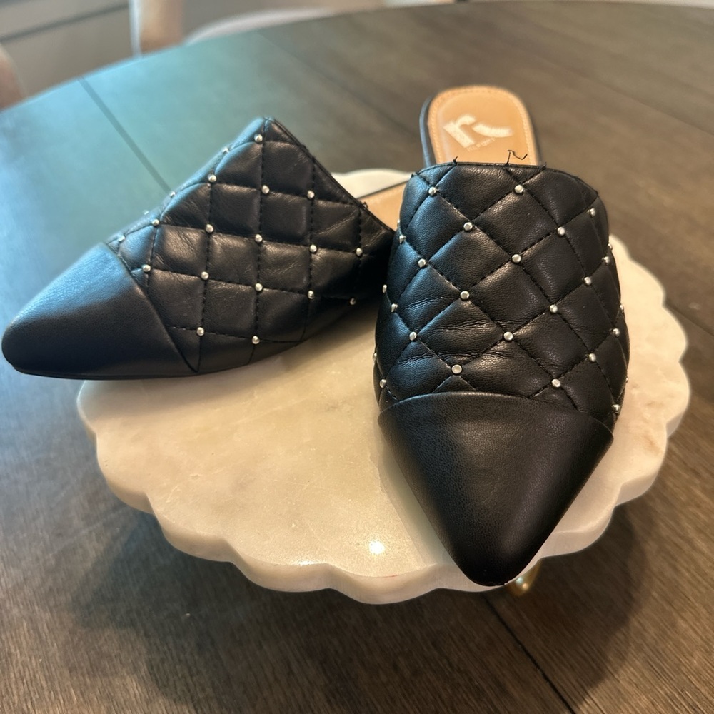 Report Black Quilted Mules with Stud Accents